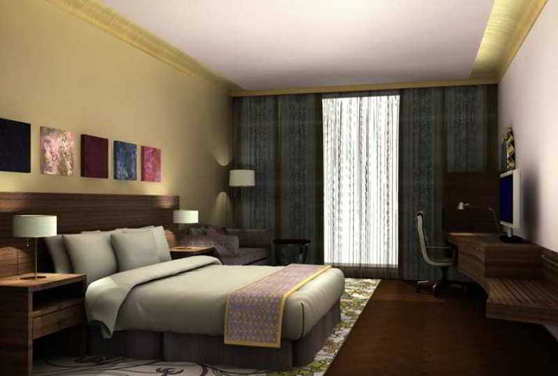 ฮิลตัน ชัยปุระ Hotel ภายนอก รูปภาพ A typical hotel room